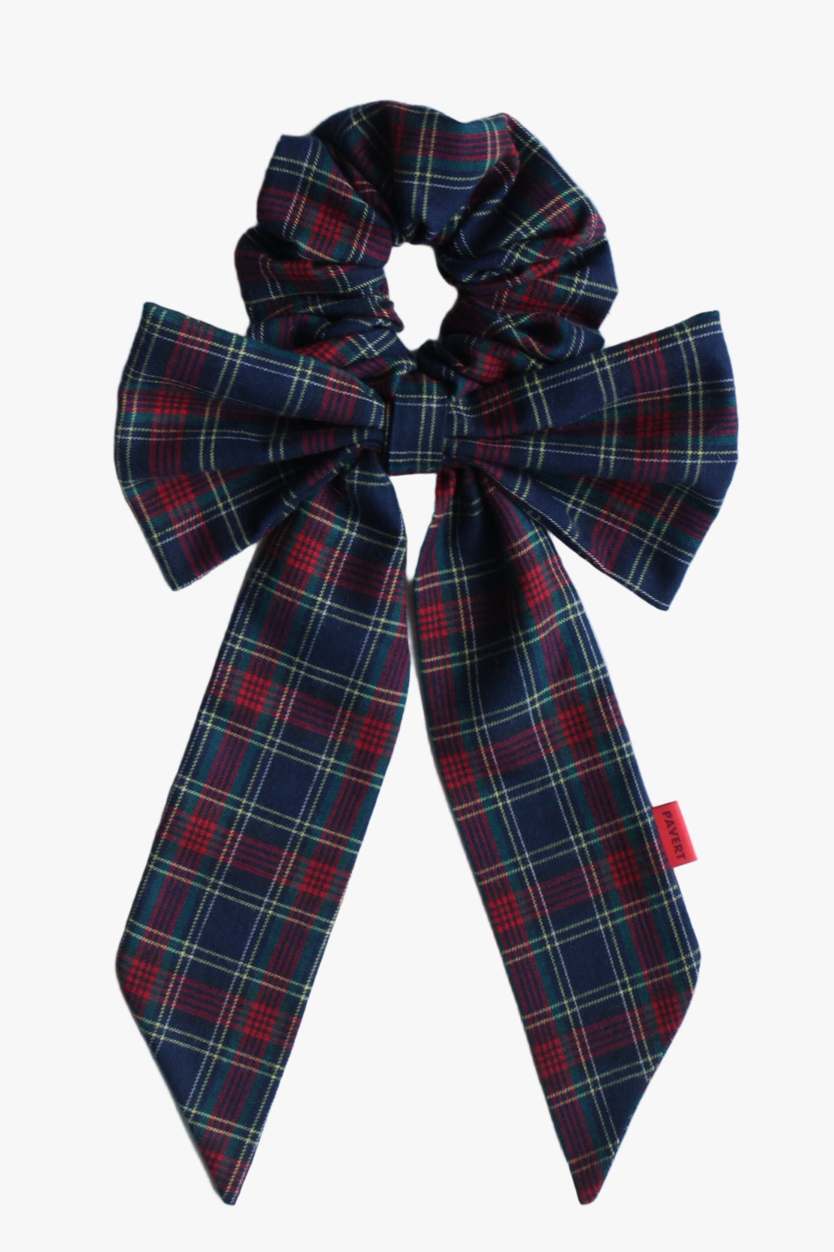 Plaid bow scrunchie on a light blue background