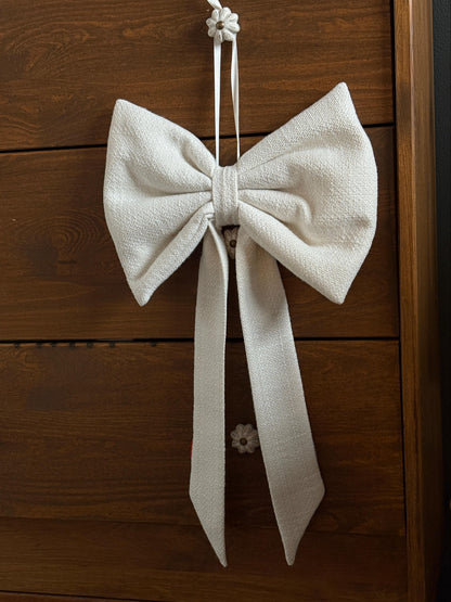 Off white boucle bow